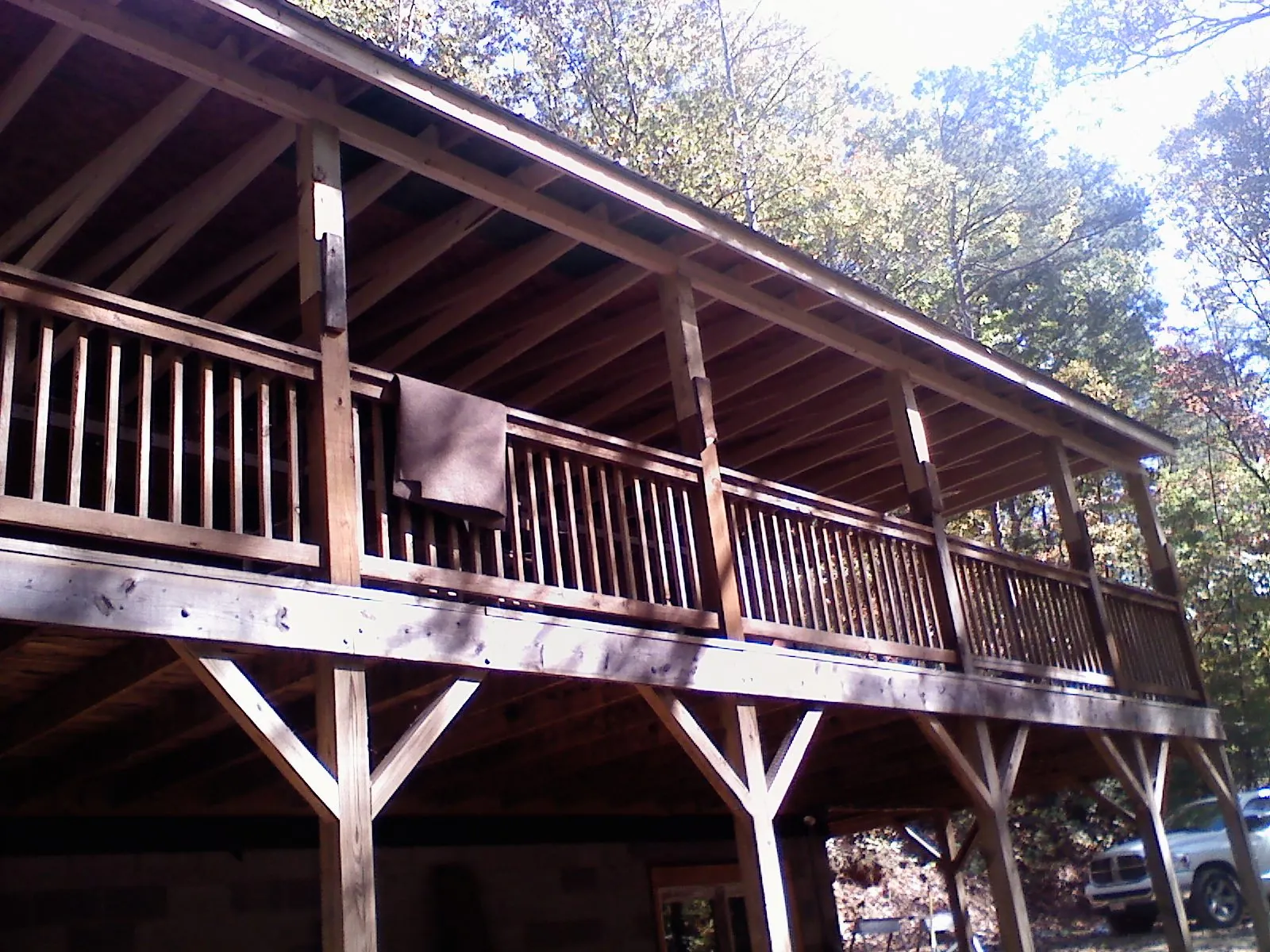 Timber framing under a new elevated porch and deck — Roof Leak Repair in North Smithfield by Roofing Brothers